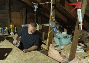 Picture of homeowner making energy efficiency improvements