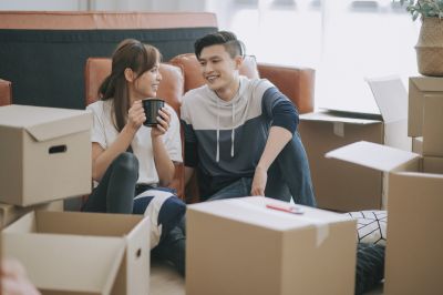 Stock Young Couple Moving In