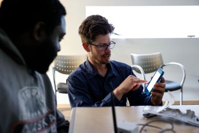 Stock Man Looking At Plans In Cold