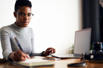 Stock Woman Working At Computer
