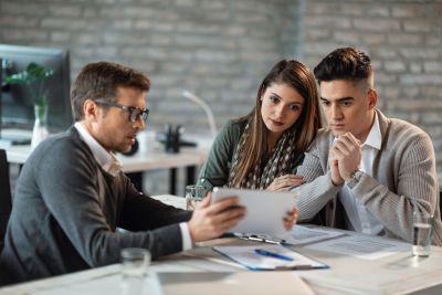 Stock Young Couple Looking At Finances