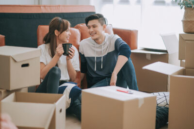 Stock Young Couple Moving In